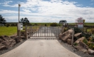 Gate on road to Tapuaetahi Beach