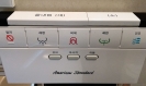 Hotel toilet buttons