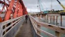 Biking over the Taramakau River bridge.